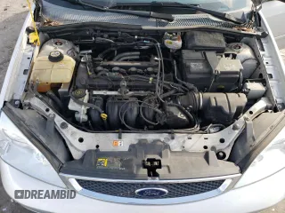 2007 Ford Focus S with VIN 1FAHP37N67W268162, listed as a Copart auction lot 71736384 with 69,391 mi miles and Salvage Title. Bid and sale history available at DreamBid. Image 11.