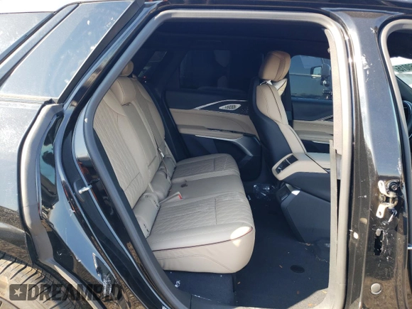2024 Cadillac LYRIQ Sport z VIN 1GYKPWRK3RZ112032, wystawiony jako Copart lot #46460015 z przebiegiem 7 203 mil mil oraz Szkoda całkowita • Salvage title. Historia ofert i sprzedaży dostępna na DreamBid. Obrazek 11.