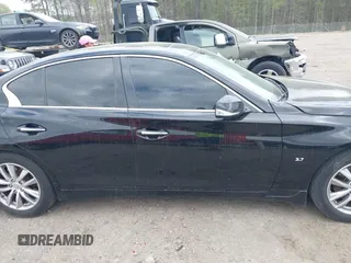 2015 Infiniti Q50 Premium with VIN JN1BV7AR1FM417342, listed as a IAAI auction lot 41887007 with 116,026 mi miles. Bid and sale history available at carsss.com. Image 13.