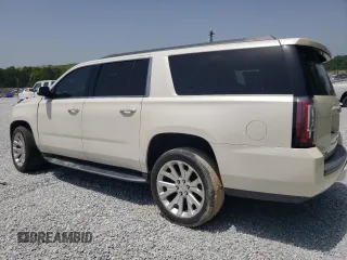 2015 GMC Yukon XL SLT with VIN 1GKS1HKC6FR167581, listed as a Copart auction lot 65600494 with 156,823 mi miles and Clean Title. Bid and sale history available at carsss.com. Image 2.