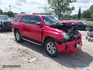 2015 Toyota 4Runner SR5 with VIN JTEZU5JR1F5095066, listed as a IAAI auction lot 40321127 with 124,716 mi miles. Bid and sale history available at carsss.com. Image 1.