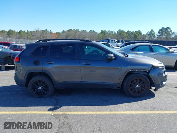2014 Jeep Cherokee Latitude with VIN 1C4PJMCS3EW298340, listed as a IAAI auction lot 41708488 with 217,438 mi miles and . Bid and sale history available at DreamBid. Image 13.