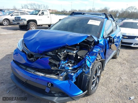 2019 Toyota C-HR XLE with VIN NMTKHMBX2KR091404, listed as a IAAI auction lot 41825675 with 64,255 mi miles. Bid and sale history available at carsss.com. Image 2.