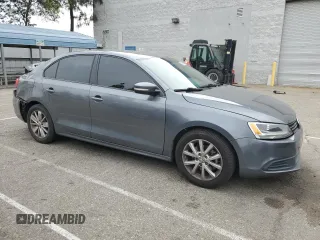 2012 Volkswagen Jetta SE with VIN 3VWDP7AJ5CM427654, listed as a Copart auction lot 60305055 with 138,222 mi miles and Salvage title. Bid and sale history available at DreamBid. Image 4.