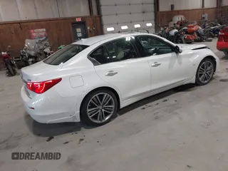 2015 Infiniti Q50 z VIN JN1BV7ARXFM409367, wystawiony jako IAAI lot #41912056 z przebiegiem 126 382 mil mil oraz . Historia ofert i sprzedaży dostępna na DreamBid. Obrazek 4.