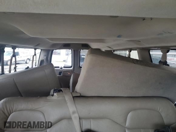 2012 Chevrolet Express Passenger 1LS z VIN 1GAZGZFA1C1125149, wystawiony jako Copart lot #51535005 z przebiegiem 199 166 mil mil oraz Czysty tytuł • Clean title. Historia ofert i sprzedaży dostępna na DreamBid. Obrazek 10.