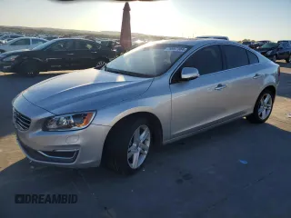 2015 Volvo S60 T5 Drive-E Premier Plus with VIN YV140MFC0F1317817, listed as a Copart auction lot 79997084 with 122,499 mi miles and Salvage Title. Bid and sale history available at carsss.com. Image 1.