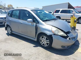 2007 Honda Fit Sport with VIN JHMGD38637S067718, listed as a IAAI auction lot 42348751 with 135,198 mi miles and . Bid and sale history available at DreamBid. Image 1.
