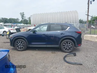 2018 Mazda CX-5 Grand Touring with VIN JM3KFBDMXJ0361812, listed as a IAAI auction lot 42509752 with 131,386 mi miles and . Bid and sale history available at DreamBid. Image 15.