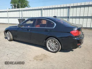 2012 BMW 3 Series 328i with VIN WBA3A5C58CF348710, listed as a Copart auction lot 61266815 with 112,720 mi miles and Salvage title. Bid and sale history available at DreamBid. Image 2.