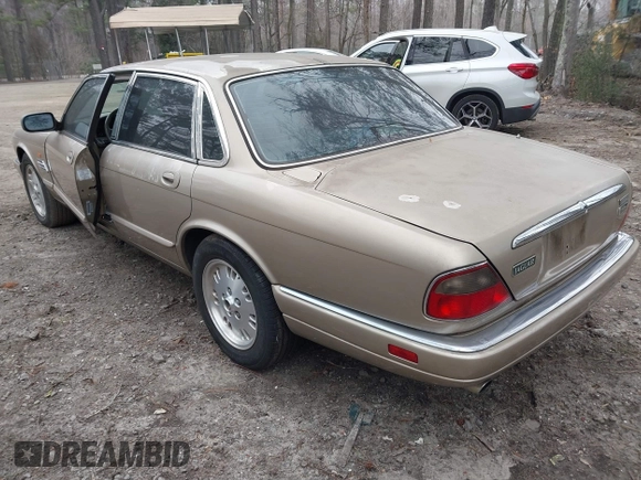 1997 Jaguar XJ with VIN SAJHX1245VC788530, listed as a IAAI auction lot 41768247 with 215,807 mi miles and . Bid and sale history available at DreamBid. Image 3.