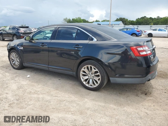 2013 Ford Taurus Limited with VIN 1FAHP2F84DG136769, listed as a Copart auction lot 60990765 with 228,994 mi miles and Salvage title. Bid and sale history available at DreamBid. Image 2.
