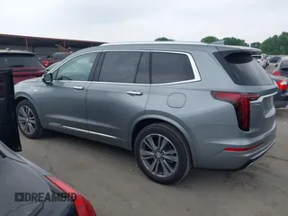 2025 Cadillac XT6 FWD Premium Luxury with VIN 1GYKPCRS4SZ119978, listed as a IAAI auction lot 41877109 with 13,579 mi miles. Bid and sale history available at carsss.com. Image 14.