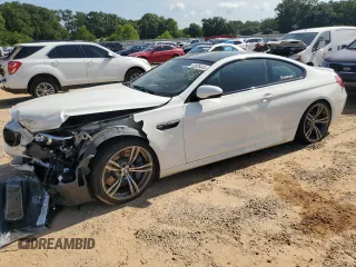 2014 BMW M6 z VIN WBSLX9C53ED160497, wystawiony jako Copart lot #62826444 z przebiegiem 55 639 mil mil oraz Szkody całkowita. Historia ofert i sprzedaży dostępna na DreamBid. Obrazek 1.