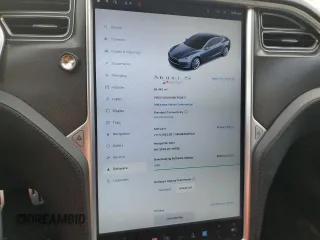 2014 Tesla Model S 60 with VIN 5YJSA1H14EFP28471, listed as a Copart auction lot 73715834 with 99,442 mi miles and Clean Title. Bid and sale history available at DreamBid. Image 9.