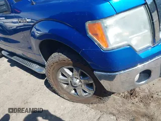 2014 Ford F-150 XL with VIN 1FTFX1EF2EFC25761, listed as a IAAI auction lot 41610999 with 265,989 mi miles. Bid and sale history available at carsss.com. Image 12.
