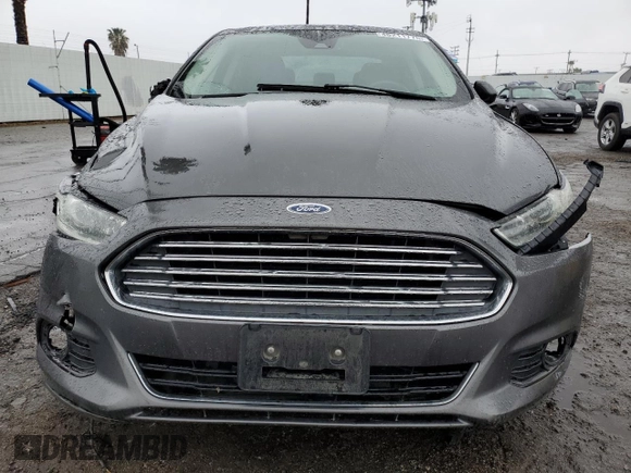 2016 Ford Fusion Titanium Hybrid z VIN 3FA6P0RU5GR356987, wystawiony jako Copart lot #48211775 z przebiegiem 145 192 mil mil oraz Szkoda całkowita • Salvage title. Historia ofert i sprzedaży dostępna na DreamBid. Obrazek 5.