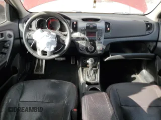 2011 Kia Forte SX с VIN KNAFW5A36B5353084, выставлен на аукционе Copart как лот 87106874 с пробегом 178 287 миль миль и Списание • Salvage title. История ставок и продаж доступна на DreamBid. Изображение 8.