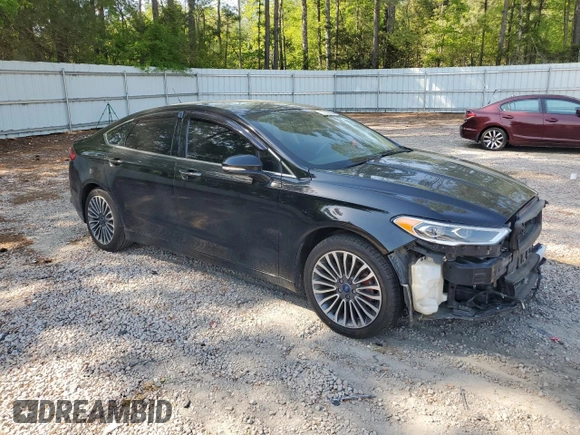 2017 Ford Fusion SE z VIN 3FA6P0H98HR328552, wystawiony jako Copart lot #52709395 z przebiegiem 188 451 mil mil oraz Szkoda całkowita • Salvage title. Historia ofert i sprzedaży dostępna na DreamBid. Obrazek 4.