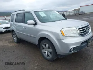 2015 Honda Pilot Touring with VIN 5FNYF4H94FB018152, listed as a IAAI auction lot 41812170 with 130,661 mi miles. Bid and sale history available at carsss.com. Image 1.