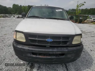 1997 Ford F-150 z VIN 1FTDF1727VNC35289, wystawiony jako Copart lot #54521915 z przebiegiem 148 171 mil mil oraz Szkoda całkowita • Salvage title. Historia ofert i sprzedaży dostępna na DreamBid. Obrazek 5.