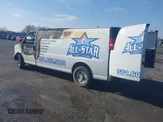 2014 Chevrolet Express Cargo Van with VIN 1GCWGGBA3E1214227, listed as a IAAI auction lot 41571911 with 1 mi miles. Bid and sale history available at carsss.com. Image 3.