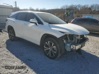 2021 Lexus RX with VIN JTJHZKFA5M2030137, listed as a Copart auction lot 42520195 with 79,355 mi miles and Salvage Title. Bid and sale history available at carsss.com. Image 4.