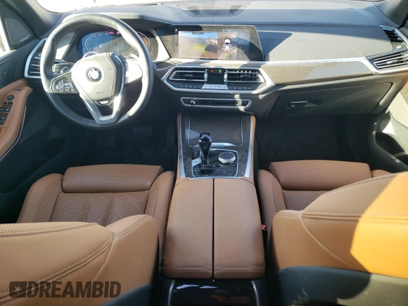 2023 BMW X5 xDrive40i with VIN 5UXCR6C0XP9P15664, listed as a Copart auction lot 47996015 with 22,849 mi miles and Salvage title. Bid and sale history available at DreamBid. Image 8.
