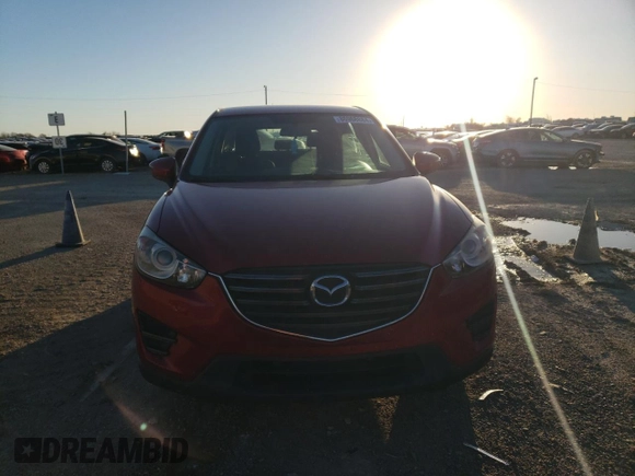 2016 Mazda CX-5 Sport with VIN JM3KE2BYXG0805613, listed as a Copart auction lot 86968884 with 114,524 mi miles and Clean Title. Bid and sale history available at carsss.com. Image 5.