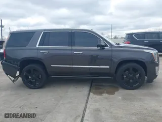 2017 Cadillac Escalade Premium Luxury with VIN 1GYS4CKJ9HR161307, listed as a IAAI auction lot 41304055 with 114,660 mi miles. Bid and sale history available at carsss.com. Image 13.