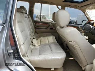 2003 Lexus LX 470 z VIN JTJHT00W733523370, wystawiony jako Copart lot #55516375 z przebiegiem 157 862 mil mil oraz Czysty tytuł • Clean title. Historia ofert i sprzedaży dostępna na DreamBid. Obrazek 11.