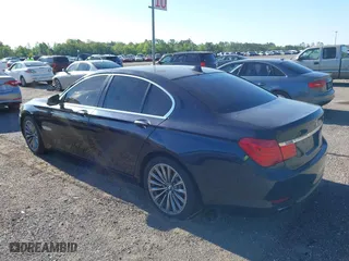 2011 BMW 7 Series 740i with VIN WBAKA4C52BC392112, listed as a IAAI auction lot 41736939 with 125,953 mi miles. Bid and sale history available at carsss.com. Image 3.