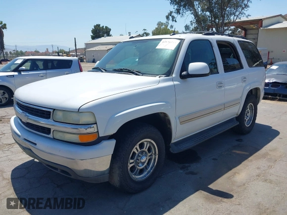 2004 Chevrolet Tahoe LS with VIN 1GNEC13T64R292075, listed as a IAAI auction lot 42138343 with 236,054 mi miles. Bid and sale history available at carsss.com. Image 2.