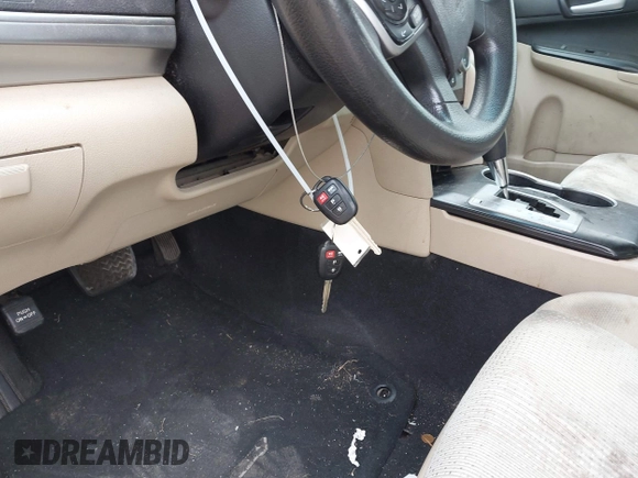 2014 Toyota Camry L with VIN 4T4BF1FK2ER390414, listed as a IAAI auction lot 41936368 with 164,811 mi miles and . Bid and sale history available at DreamBid. Image 11.