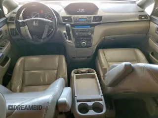 2012 Honda Odyssey Touring с VIN 5FNRL5H94CB049626, выставлен на аукционе Copart как лот 61191435 с пробегом 199 728 миль миль и Списание • Salvage title. История ставок и продаж доступна на DreamBid. Изображение 8.