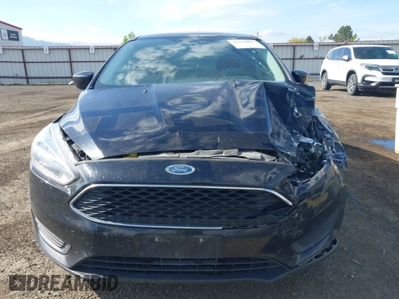 2018 Ford Focus SE z VIN 1FADP3F20JL288437, wystawiony jako IAAI lot #42278885 z przebiegiem 132 504 mil mil oraz . Historia ofert i sprzedaży dostępna na DreamBid. Obrazek 12.