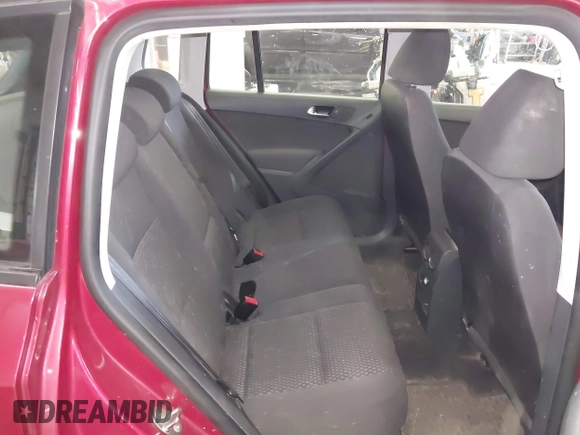 2011 Volkswagen Tiguan SE with VIN WVGBV7AX9BW000461, listed as a IAAI auction lot 42032028 with 149,896 mi miles and . Bid and sale history available at DreamBid. Image 8.