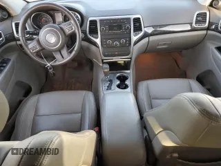 2011 Jeep Grand Cherokee Laredo with VIN 1J4RR4GG4BC640277, listed as a Copart auction lot 52166205 with 195,877 mi miles and Salvage Title. Bid and sale history available at DreamBid. Image 8.