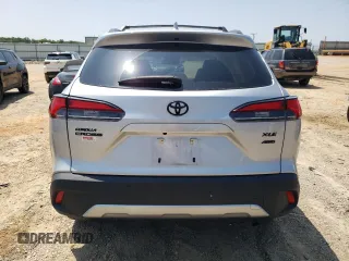 2023 Toyota Corolla Cross XLE с VIN 7MUDAABG6PV054981, выставлен на аукционе Copart как лот 59011125 с пробегом 32 254 миль миль и Списание • Salvage title. История ставок и продаж доступна на DreamBid. Изображение 6.