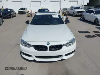 2016 BMW 4 Series 435i xDrive with VIN WBA4B3C58GG528016, listed as a IAAI auction lot 41506077 with 87,975 mi miles and . Bid and sale history available at DreamBid. Image 12.