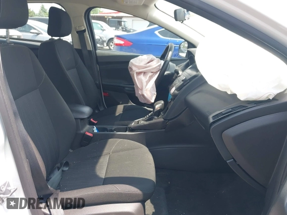 2018 Ford Focus SE z VIN 1FADP3FE5JL267982, wystawiony jako IAAI lot #42646881 z przebiegiem 40 163 mil mil oraz . Historia ofert i sprzedaży dostępna na DreamBid. Obrazek 5.