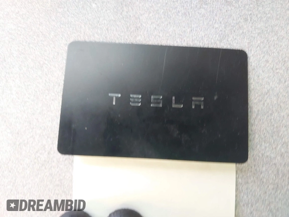 2025 Tesla Model Y Long Range with VIN 7SAYGDEEXSA346006, listed as a IAAI auction lot 41835610 with 1,896 mi miles and . Bid and sale history available at carsss.com. Image 11.