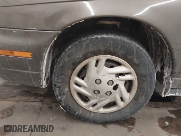 1998 Saturn SL z VIN 1G8ZH528XWZ240574, wystawiony jako IAAI lot #41588681 z przebiegiem Nie podano mil oraz . Historia ofert i sprzedaży dostępna na DreamBid. Obrazek 11.