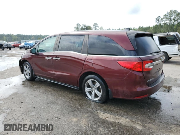 2018 Honda Odyssey EX-L z VIN 5FNRL6H75JB097041, wystawiony jako Copart lot #50617535 z przebiegiem 169 040 mil mil oraz Szkoda całkowita • Salvage title. Historia ofert i sprzedaży dostępna na DreamBid. Obrazek 2.