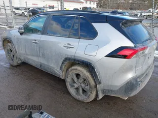 2021 Toyota RAV4 Hybrid XSE with VIN 4T3E6RFV8MU059858, listed as a IAAI auction lot 41423611 with 14,281 mi miles and . Bid and sale history available at DreamBid. Image 3.