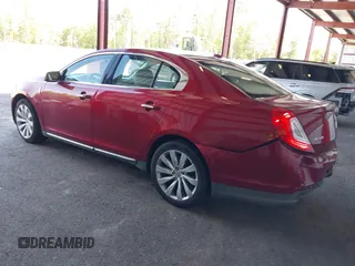 2014 Lincoln MKS z VIN 1LNHL9DK0EG606497, wystawiony jako IAAI lot #42279603 z przebiegiem 129 972 mil mil oraz . Historia ofert i sprzedaży dostępna na DreamBid. Obrazek 3.