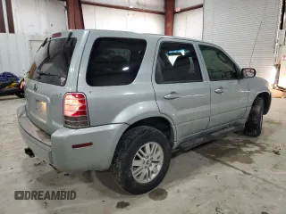 2005 Mercury Mariner Luxury z VIN 4M2CU57135DJ00228, wystawiony jako Copart lot #87603775 z przebiegiem 169 099 mil mil oraz Szkody całkowita. Historia ofert i sprzedaży dostępna na DreamBid. Obrazek 3.