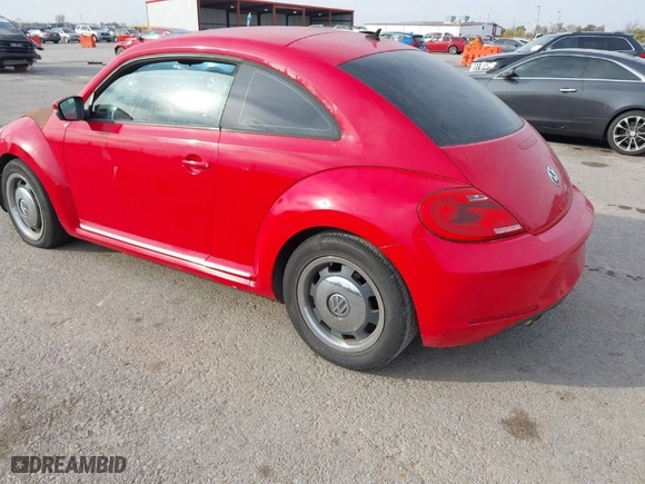 2012 Volkswagen Beetle 2.5L PZEV with VIN 3VWJP7AT0CM641164, listed as a IAAI auction lot 40698387 with 113,200 mi miles. Bid and sale history available at carsss.com. Image 3.