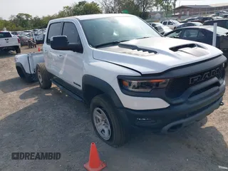 2021 Ram 1500 TRX with VIN 1C6SRFU93MN699456, listed as a IAAI auction lot 40268082 with 14,833 mi miles. Bid and sale history available at carsss.com. Image 1.