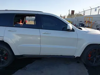 2017 Jeep Grand Cherokee SRT with VIN 1C4RJFDJ7HC600227, listed as a IAAI auction lot 41390600 with 96,841 mi miles. Bid and sale history available at carsss.com. Image 14.